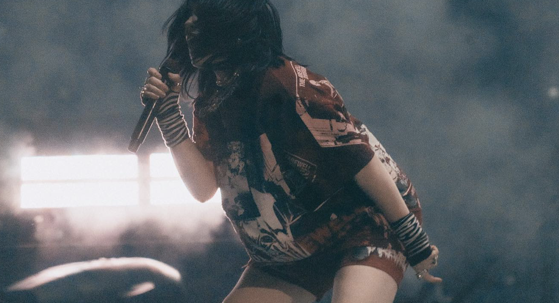 The Real Reason Billie Eilish Strapped a Black Tape to Her Leg at the KL Concert Revealed