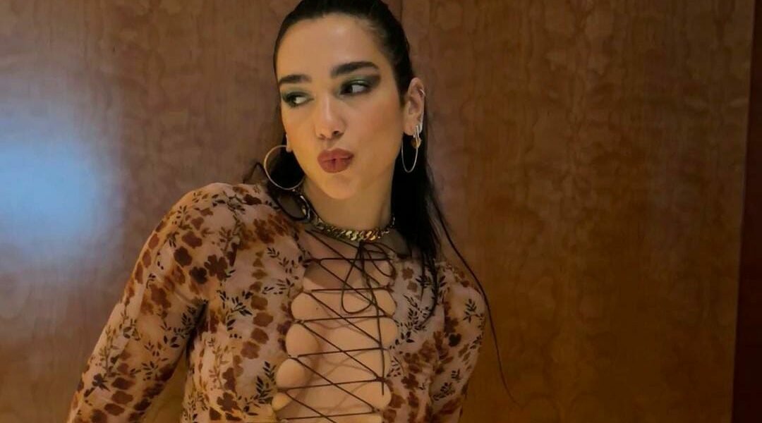 Donning Hoops and Ponytails, Dua Lipa is Levitating Onto an Iconic Fashion Decade, the 90s