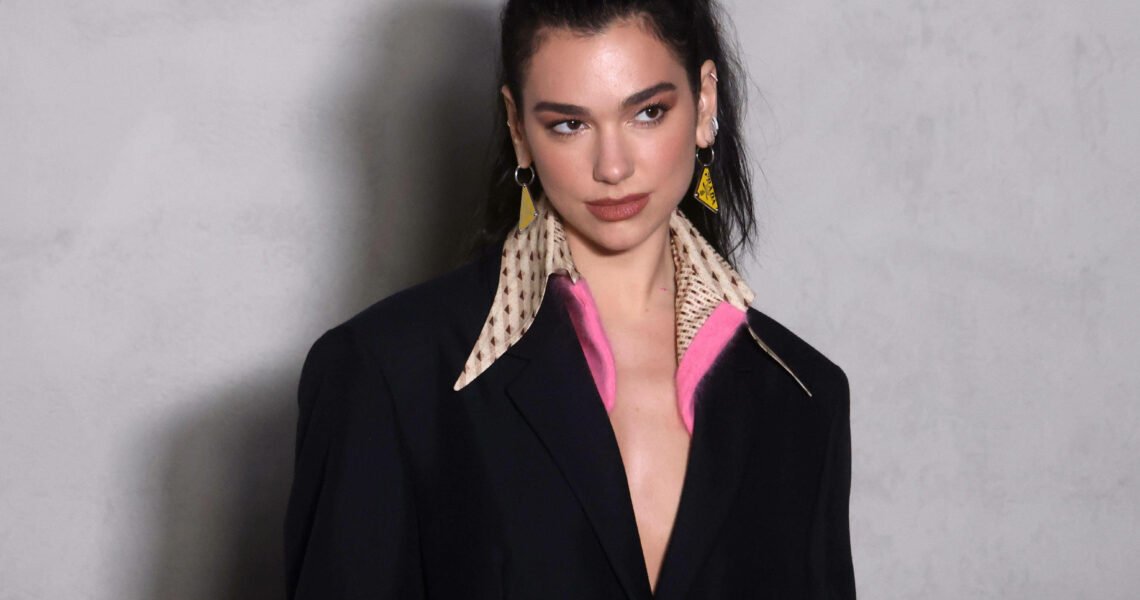 Dua Lipa Leaves The World Stunned As She Dazzles In a Black Dress at GSDC Fashion Show in Milan