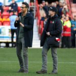 Ryan Reynolds and Rob McElhenney at National League Match between Wrexham and Torquay United at Racecourse Ground on 30 Oct 2021