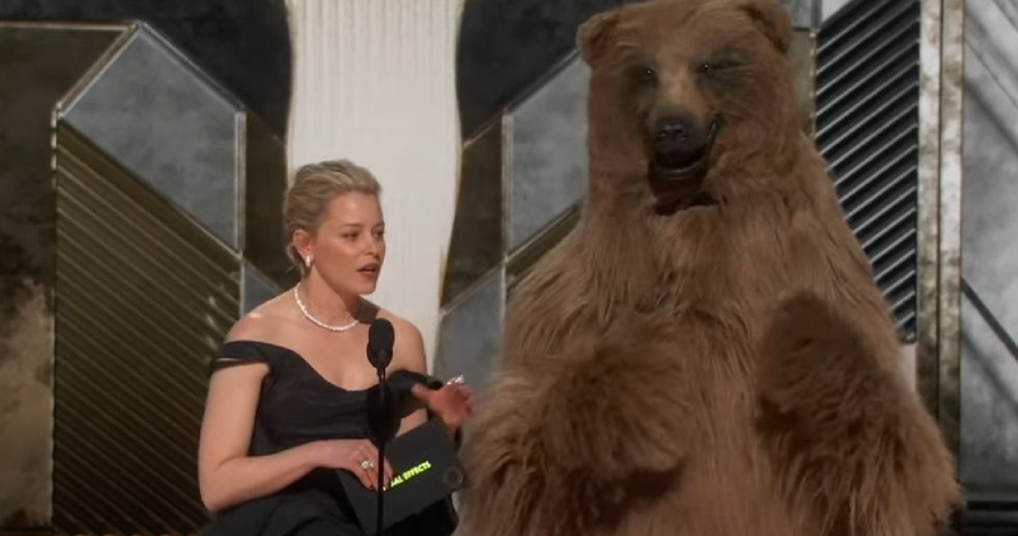 Fans Pour in Congratulations for ‘Cocaine Bear’ as Elizabeth Banks and the Mysterious Bear Arrive at Oscars Stage for Award Giving